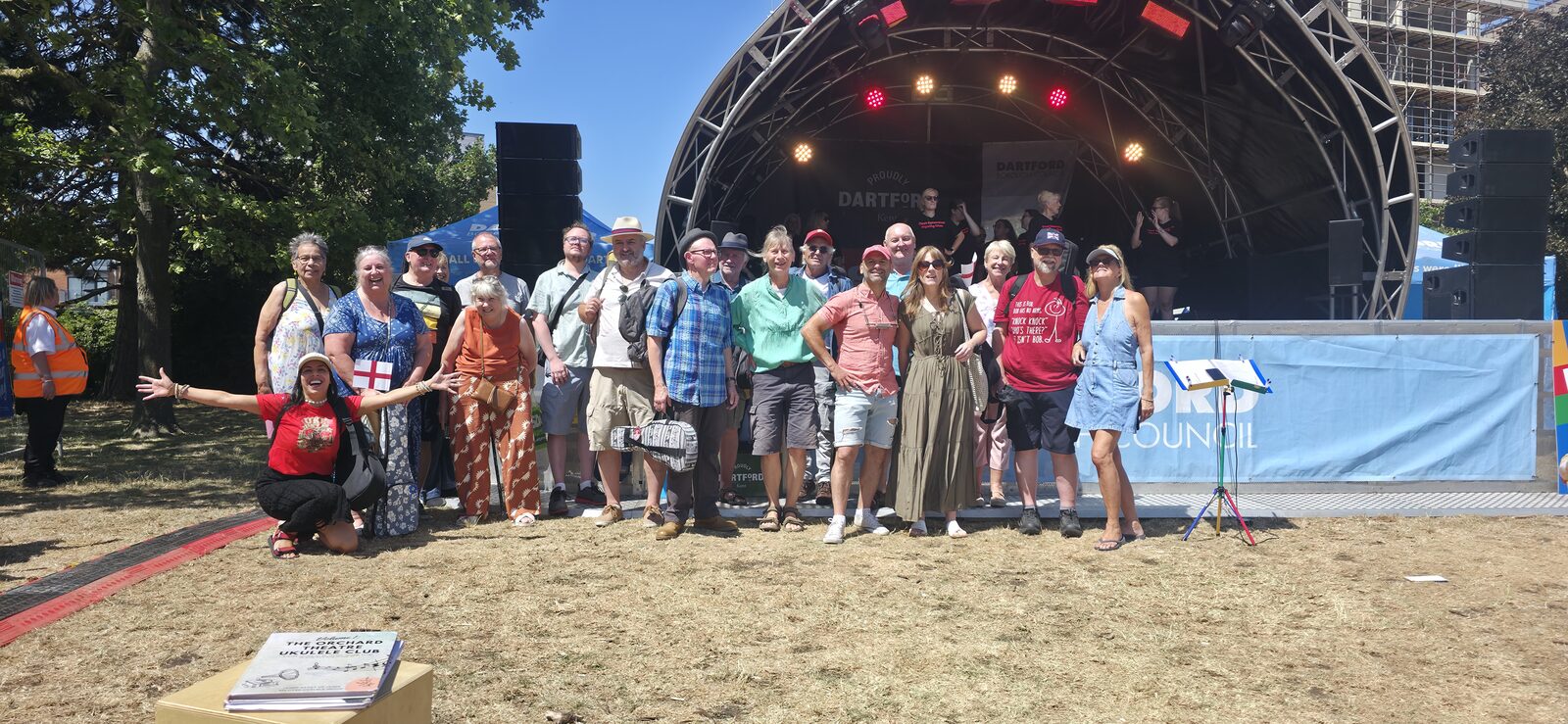 A ukulele group gathered together outdoors at the Dartford Big Day Out festival