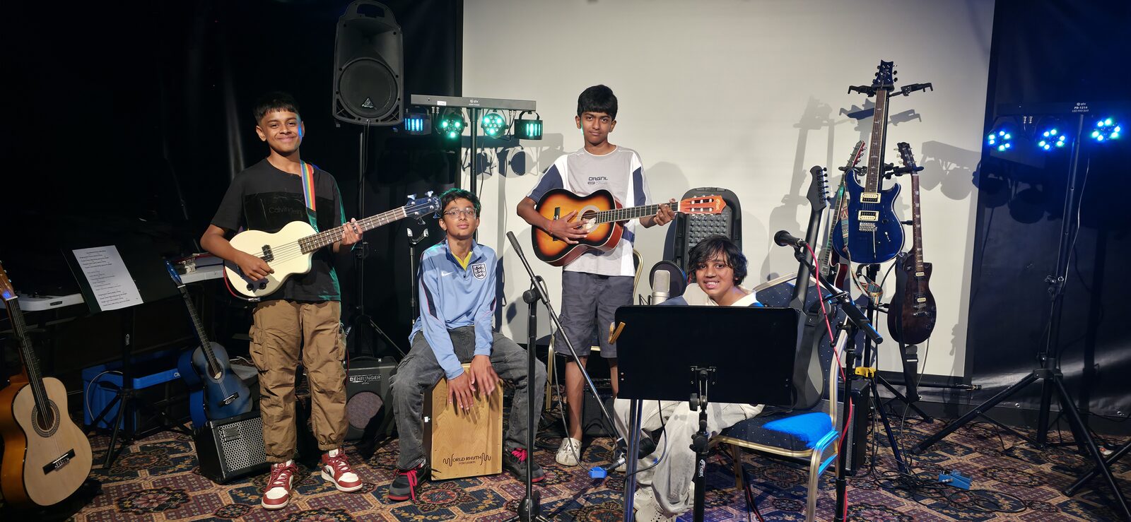 Young musicians developing confidence and performance experience on stage through De Jager Guitar School