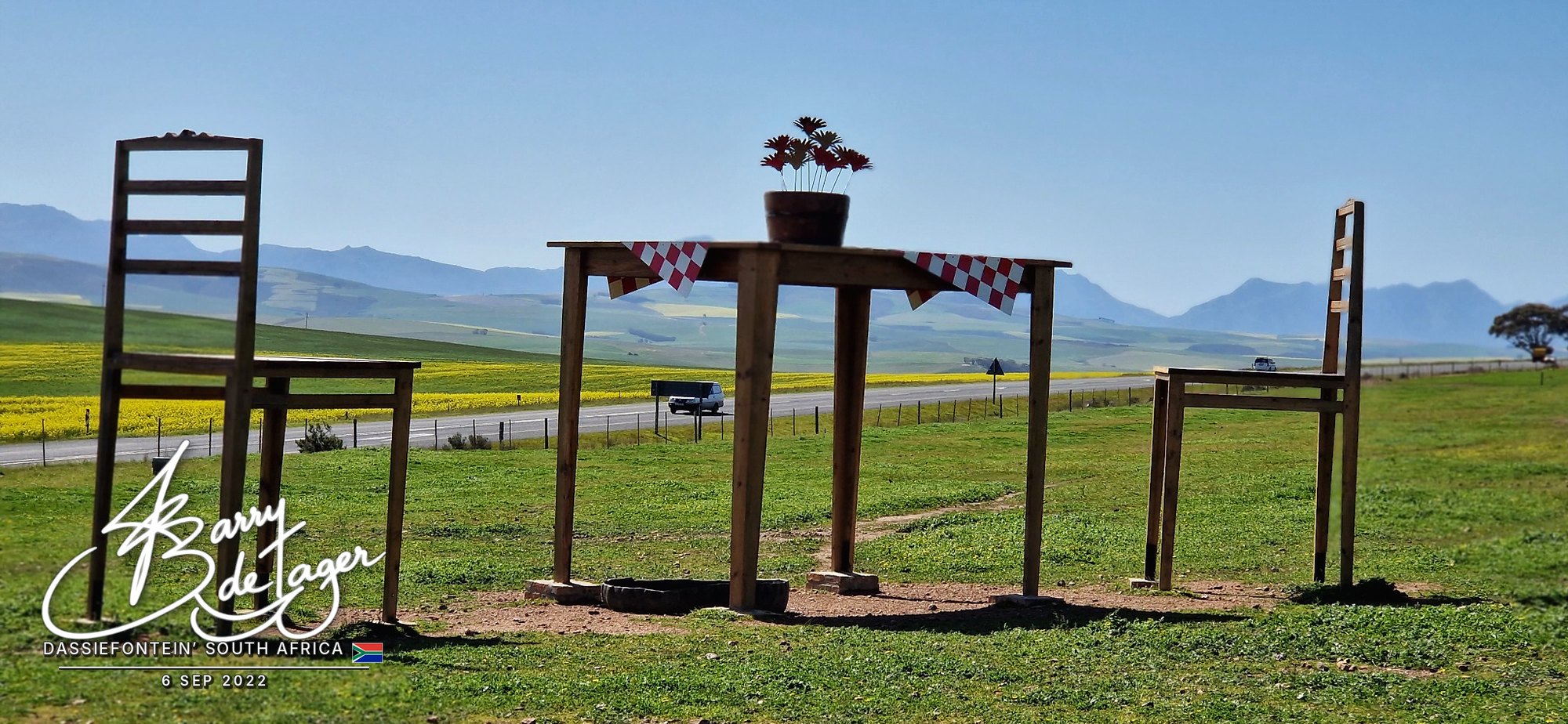 Giant table and chairs standing in open countryside at Dassiefontein, South Africa