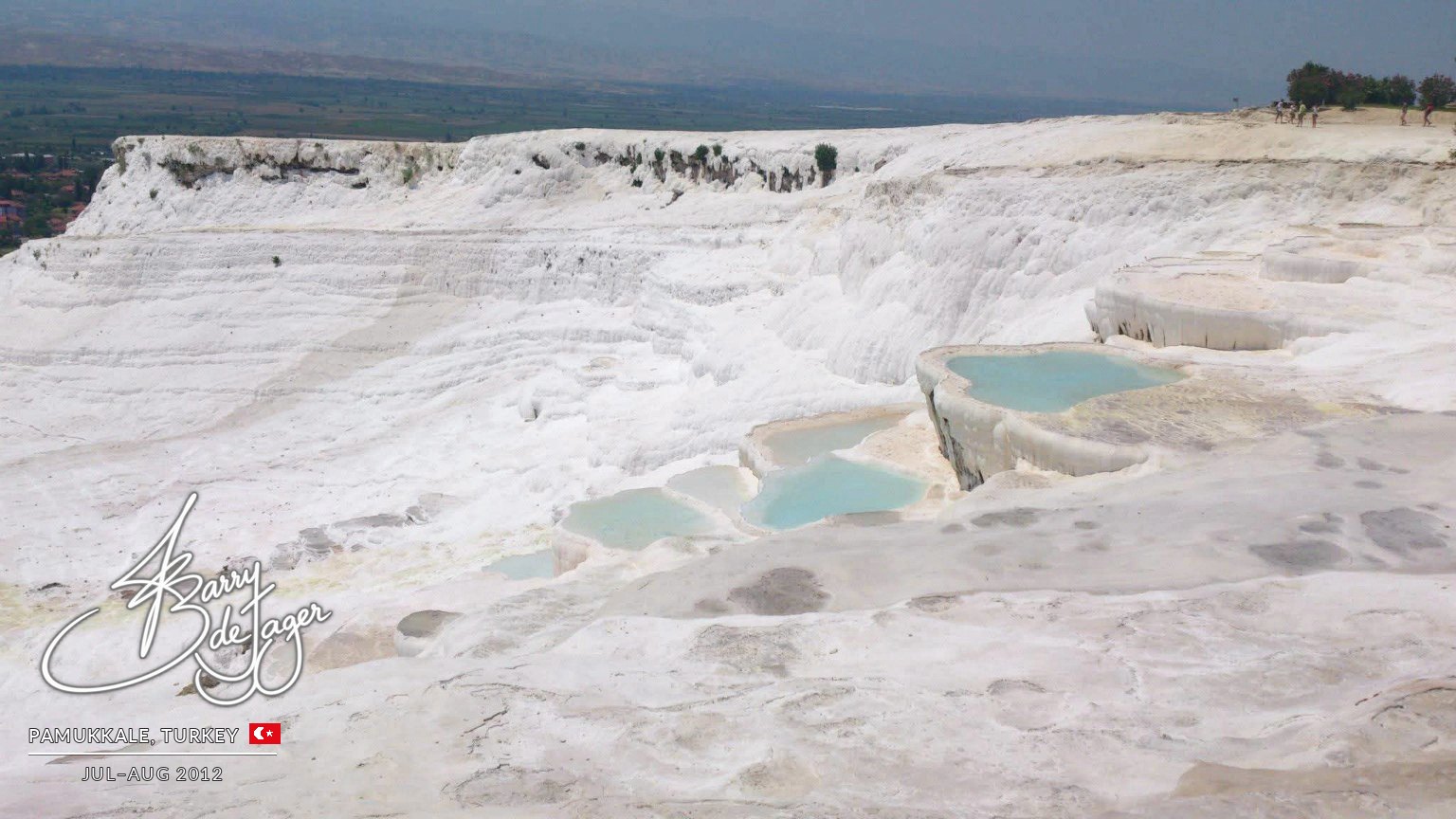 White travertine terraces with turquoise pools at Pamukkale